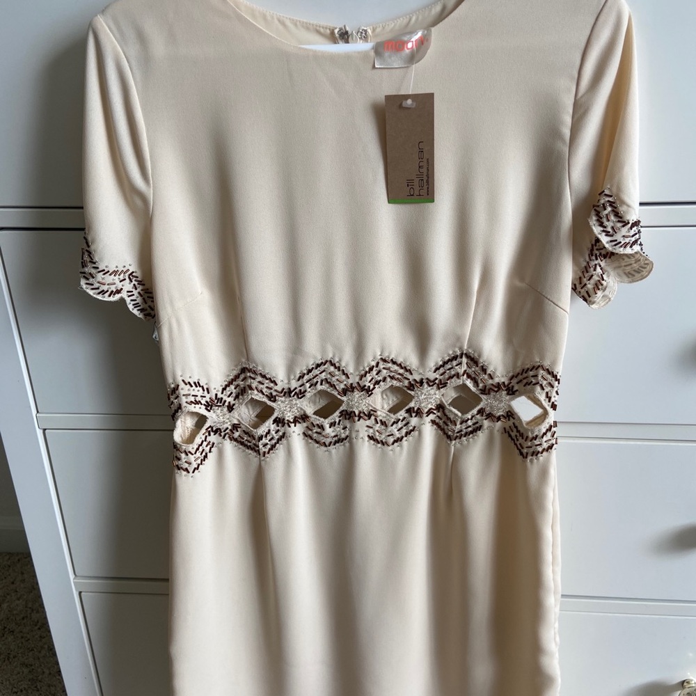 Cream Dress with cutout embroidery